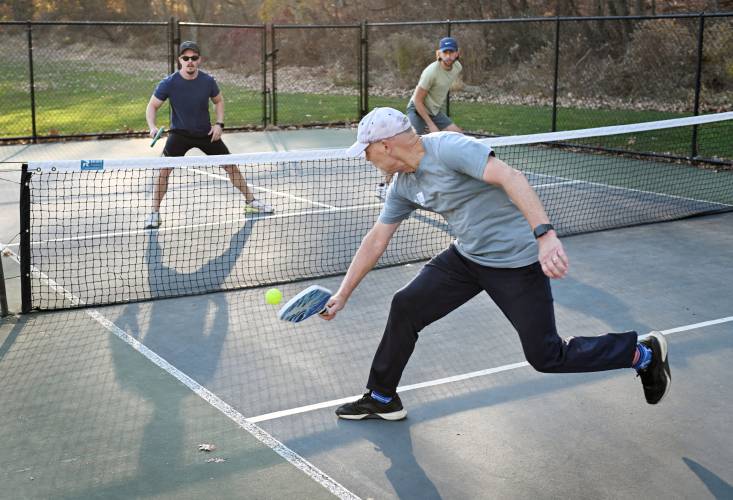 Greenfield resident Ben Marsden returns a volley from Matt Bassett of Northfield and Nate Smith of Bernardston while playing pickleball with partner Charlie Tormanen of Montague, not pictured, at Green River Park in Greenfield in November. The city’s Community Preservation Committee heard two separate requests for pickleball courts as it reviews 14 applicants for fiscal year 2026 Community Preservation Act (CPA) funding. Greenfield resident Ben Marsden returns a volley from Matt Bassett of Northfield and Nate Smith of Bernardston while playing pickleball with partner Charlie Tormanen of Montague, not pictured, at Green River Park in Greenfield in November. The city’s Community Preservation Committee heard two separate requests for pickleball courts as it reviews 14 applicants for fiscal year 2026 Community Preservation Act (CPA) funding.