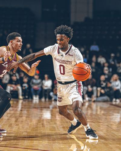  UMass sophomore Jaylen Curry (0) drives to the hoop during first half of the UMass men’s basketball team’s 74-51 loss to Loyola Chicago on Saturday, March 8 at the Mullins Center in Amherst, MA.
