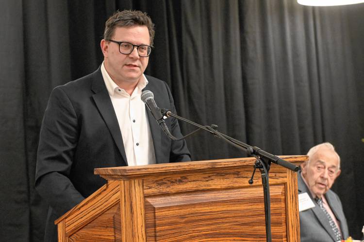 Pioneer Valley Executive Editor Dan Crowley speaks at the  Citizen of the Year award ceremony at Deerfield Academy on Friday morning.