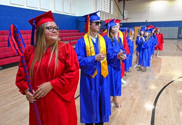 Seniors line up in the gym prior to graduation on Friday.