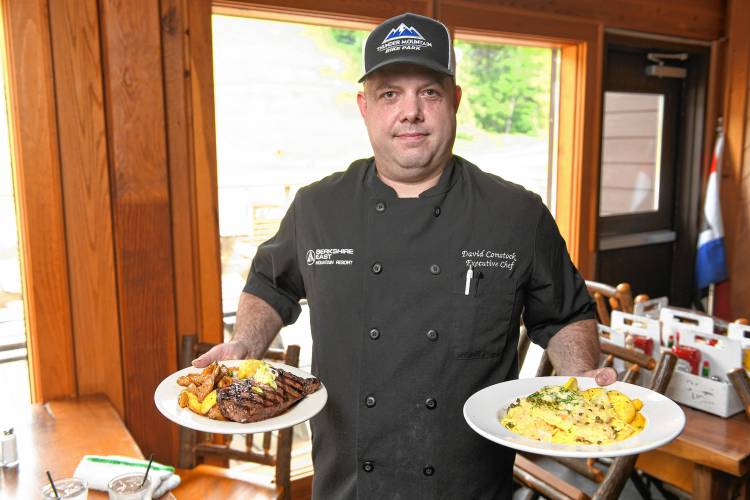 David Comstock, executive chef at Berkshire East Mountain Resort, with strip steak and chicken piccata.