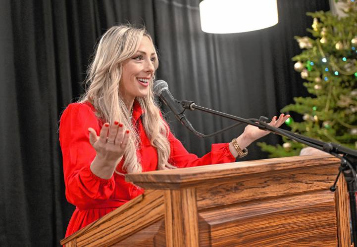 Franklin County Chamber of Commerce Executive Director Jessye Deane welcomes guests at the Citizen of the Year award ceremony on Friday morning at Deerfield Academy.