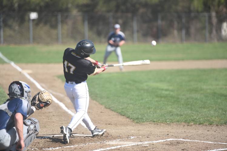 Smith Vocational's Jared Baer blasts a base hit against Franklin Tech on Tuesday at Arcanum Field in Northampton. 