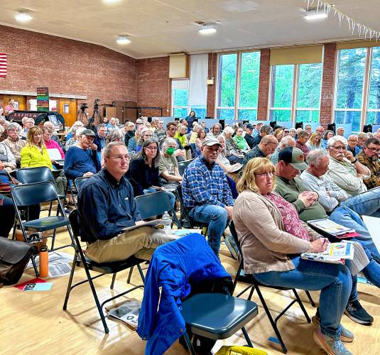 It was standing room only at Shelburne’s Annual Town Meeting on Tuesday. Some in the back row took down kids’ chairs to sit on during the three-hour meeting.