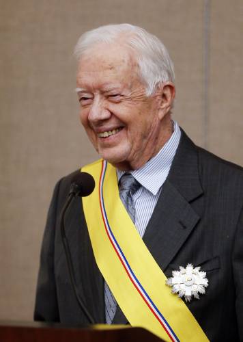 Former President Jimmy Carter addresses the audience after being awarded the Order of Manuel Amador Guerrero by Panamanian President Juan Carlos Varela during a ceremony at The Carter Center in Atlanta on Jan. 14, 2016. The award, named for Panama’s first president, recognizes distinguished people in the areas of politics, science and the arts.