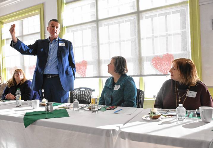 From left are state Rep. Susannah Whipps, Housing Secretary Edward Augustus (standing), state Sen. Jo Comerford, and Executive Office of Aging and Independence Secretary Robin Lipson during an event Tuesday outlining plans for Evergreen Circle at Care Drive, a senior and multi-generational housing project planned in Erving.
