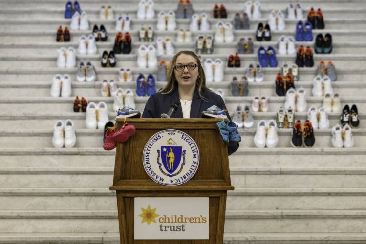 Serenity Smith, a lifelong Orange resident and a Healthy Families home visitor, speaks in front of the State House at an April 16 event recognizing Child Abuse Prevention Month. Smith, 25, is a former Healthy Families participant and shared her journey of receiving support as a young parent and returning to support other families.