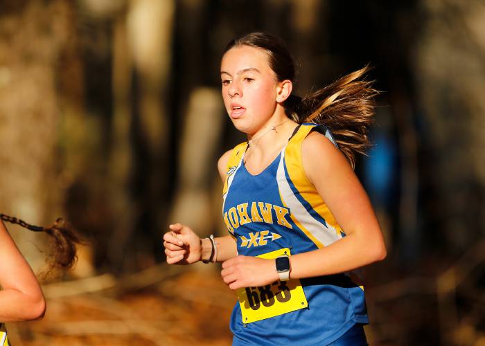 Mohawk Trail’s Virginia Krezmien (683) runs to a 13th place finish with a time of 21:17.98 during the MIAA Division 3 girls cross country state qualifier at Northfield Mountain last Saturday.