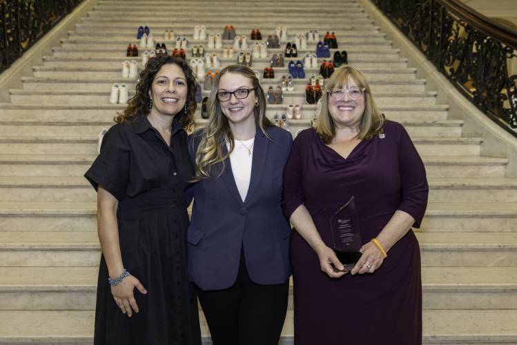 From left, Jennifer Valenzuela, executive director of the Children’s Trust, lifelong Orange resident Serenity Smith and state Rep. Susannah Whipps at the State House on April 16. Smith, a Healthy Families home visitor, spoke at an event recognizing Child Abuse Prevention Month. Whipps received a Valuing Our Children Award at the event for her commitment to policies and programs that support families in the state.