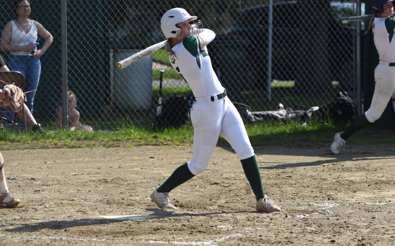 Greenfield’s MacKenzie Paulin belts a home run during the Green Wave’s 5-2 win over Agawam on Friday afternoon at Vets Field in Greenfield.
