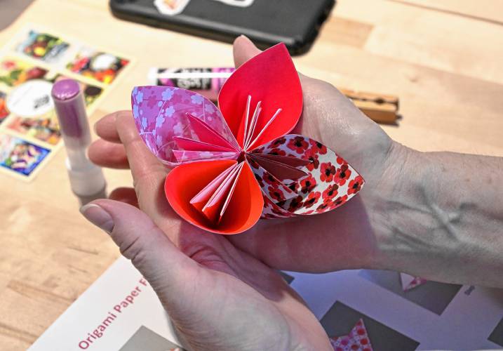 Paper flowers created during a workshop at the Greenfield Public Library on Friday.
