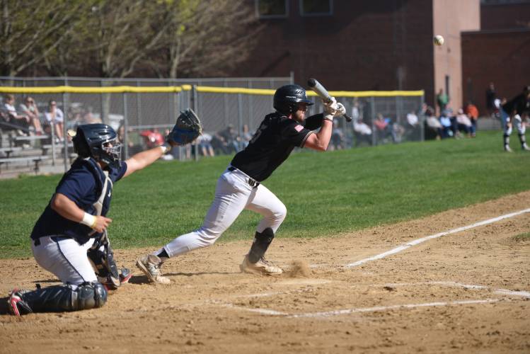 Pioneer's Braeden Tsipenyuk puts down a bunt against Frontier in South Deerfield Wednesday. 