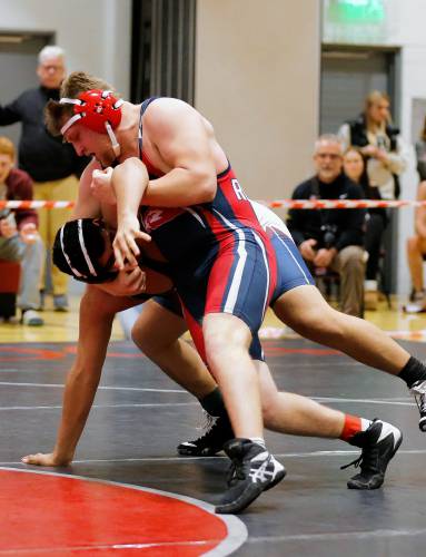 Frontier’s Alexander Schreiber competes to a first place finish against  Hampden Charter’s Ahmed Elkadri in the 190-pound final Saturday during the MIAA Division 3 Western Mass wrestling championships at Mount Greylock Regional School in Williamstown. 