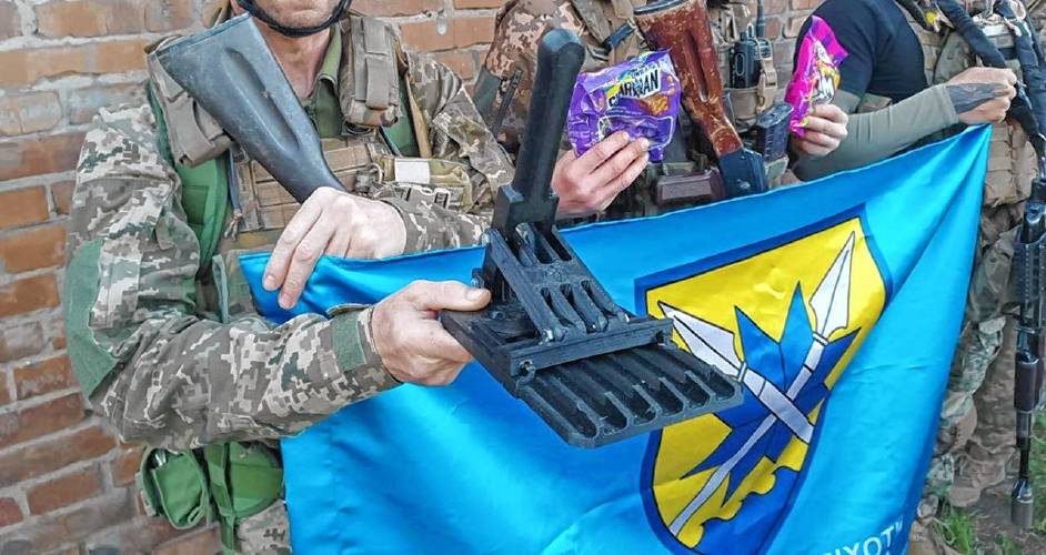 A PKM speed loader held by a Ukrainian soldier at the point of delivery. Luke Henrici is using 3D printers at his Ashfield home to make equipment to send to Ukraine to help in the war against Russia.