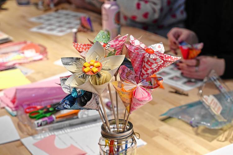 Paper flowers created during a workshop at the Greenfield Public Library on Friday.