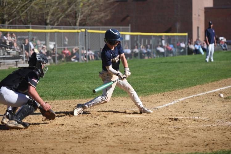 Frontier's Ben Caron before putting the ball in play against Pioneer in South Deerfield Wednesday. 