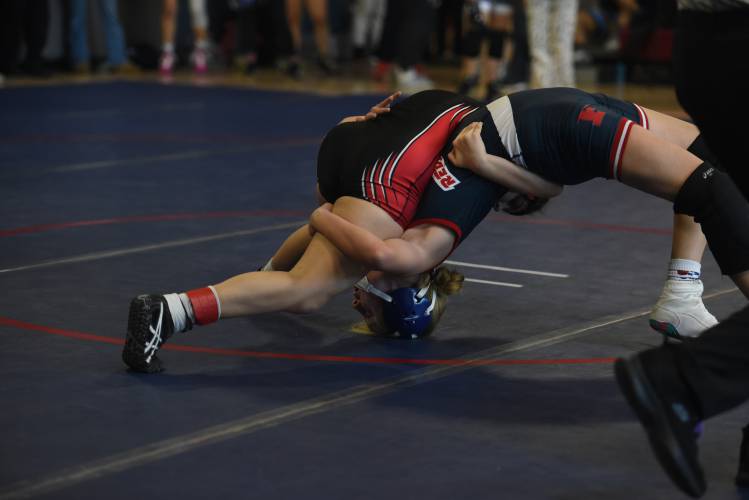 Frontier's Jocelyn Antes (right) competes  at the Mahar Girls Wrestling Tournament in Orange earlier this season.  