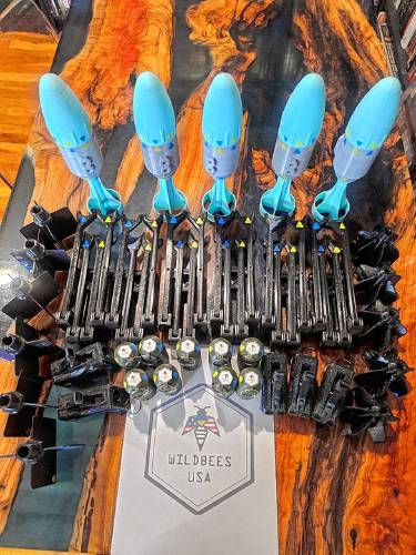 An assortment of aerodynamic fins, speed loaders and take-off frames 3D-printed by Luke Henrici, who is using 3D printers at his Ashfield home to make equipment to send to Ukraine to help in the war against Russia.