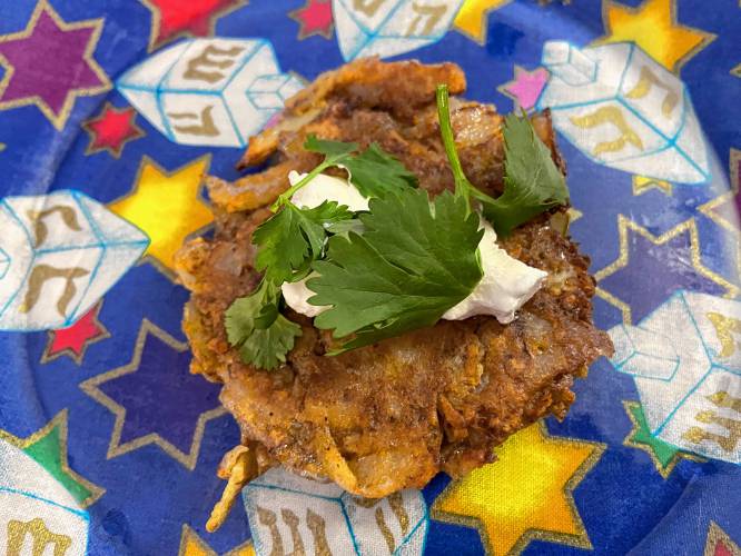 There’s nothing wrong with plain potato pancakes. My family would be happy eating straightforward potato-and-onion latkes each December. Nevertheless, the food writer in me doesn’t let allow them to do that. This year I am serving Southwestern Latkes. I have added typical Southwestern seasonings like chiles, cumin, and cilantro to my pancakes.