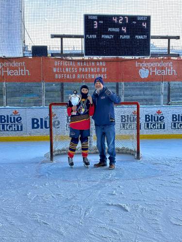 Asa Bouchard with his dad, Adam Bouchard, after winning the Buffalo River Classic with the Springfield Junior Thunderbirds last weekend. Asa Bouchard with his dad, Adam Bouchard, after winning the Buffalo River Classic with the Springfield Junior Thunderbirds last weekend.