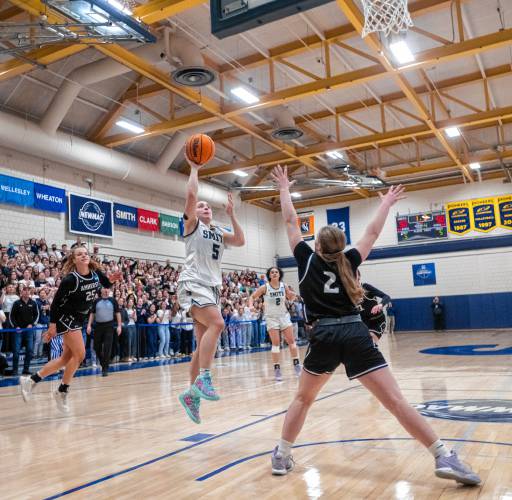 Smith guard Ally Landau (5) attempts a layup during the NCAA Division 3 Women's Basketball tournament Round of 32 game against Amherst at Ainsworth Gym, Saturday, March 8, 2025, in Northampton. The layup would eventually score, giving Smith the win over Amherst 52-50.