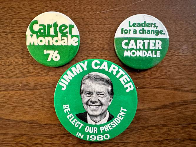 Campaign buttons for the Carter/Mondale presidential campaigns.