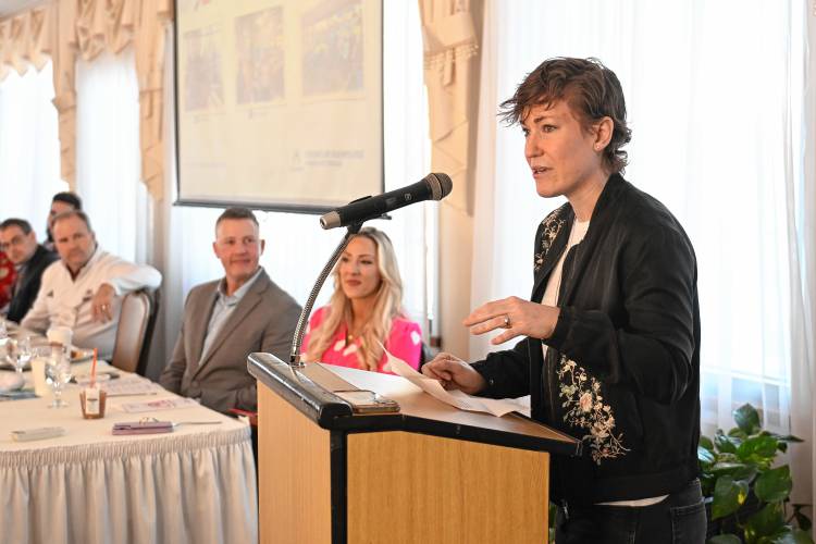 Sarah Wilson, executive director of the MassHire Franklin Hampshire Workforce Board, tells those in attendance at the Franklin County Chamber of Commerce breakfast about her job. The breakfast was held at Terrazza Ristorante in Greenfield.