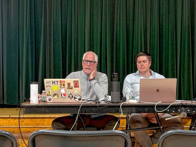 Jake Eberwein and Brendan Sheran of the Pittsfield-based Berkshire Educational Resources K-12 (BERK12) research team present proposed models for restructuring the Mohawk Trail and Hawlemont Regional school districts on Tuesday. Jake Eberwein and Brendan Sheran of the Pittsfield-based Berkshire Educational Resources K-12 (BERK12) research team present proposed models for restructuring the Mohawk Trail and Hawlemont Regional school districts on Tuesday.