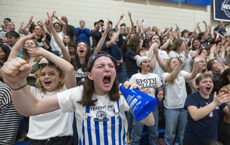 Piper Corey, left, and Smith fans erupt with cheers after a basket is made during the NCAA Division 3 Women's Basketball tournament Round of 32 game against Amherst at Ainsworth Gym, Saturday, March 8, 2025, in Northampton.