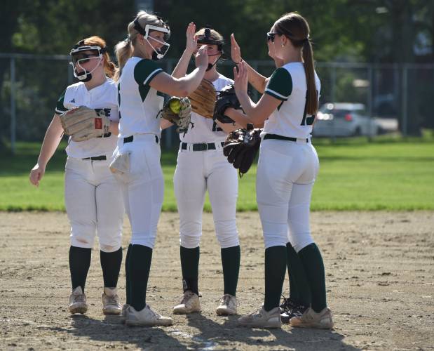 Greenfield celebrates a MacKenzie Paulin strikeout during the Green Wave’s 5-2 win over Agawam on Friday afternoon at Vets Field in Greenfield.