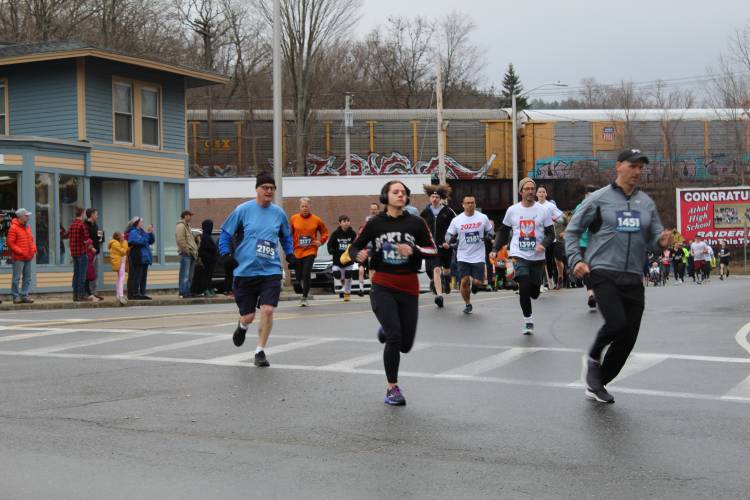 Runners brave the rain for the Big Cheese 5K in 2022 as part of the River Rat Race festivities. Runners brave the rain for the Big Cheese 5K in 2022 as part of the River Rat Race festivities.