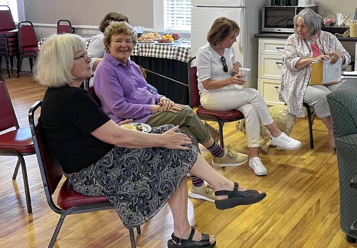 Eileen Mariani (second from left) of Montague Center pictured during a Montague Villages information session alongside fellow attendees. Eileen Mariani (second from left) of Montague Center pictured during a Montague Villages information session alongside fellow attendees.