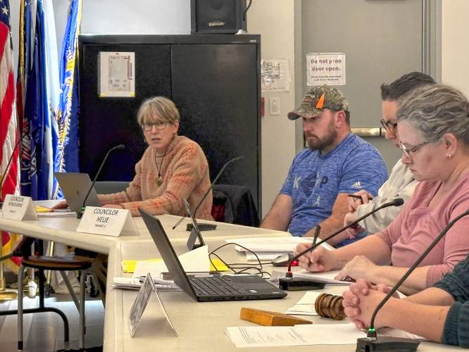 Greenfield city councilors voted unanimously on Tuesday to name Lora Wondolowski, left, as City Council president during a meeting at the John Zon Community Center.