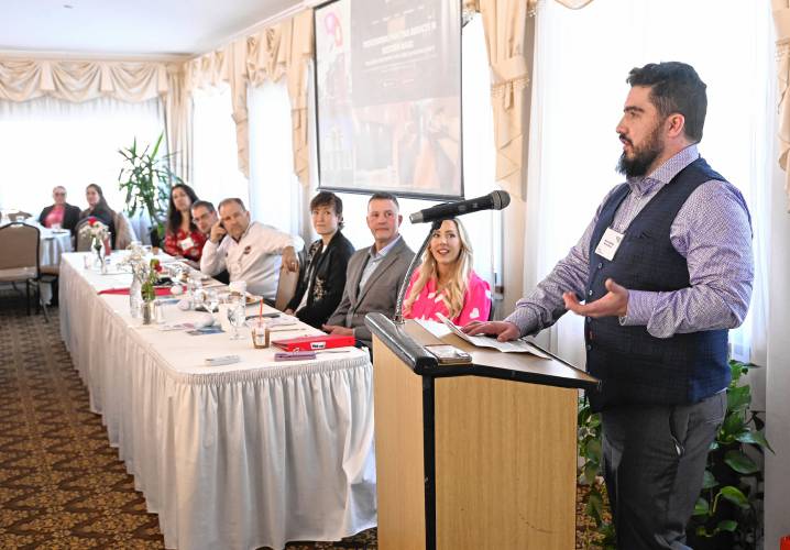 Patrick Rohfling, owner of Mindful Painting, tells those in attendance at the Franklin County Chamber of Commerce breakfast about his job. The breakfast was held at Terrazza Ristorante in Greenfield.