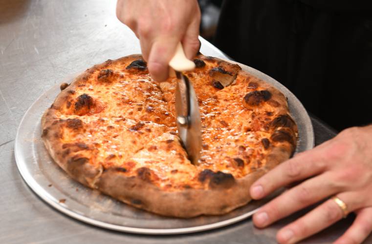 Wood-fired pizza at Flis Market in Erving.