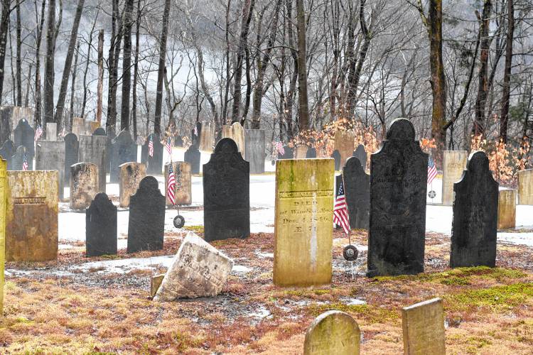Fog rises in the cemetery behind Mary Lyon Church in Buckland. Fog rises in the cemetery behind Mary Lyon Church in Buckland.