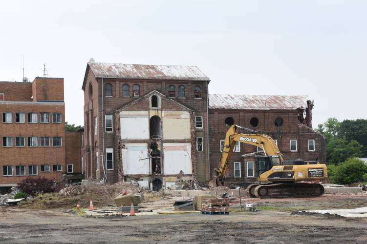 Since the old Farren Care Center was demolished, pictured, and ownership was transferred to the town of Montague in the fall of 2023, town officials have been conversing with the Massachusetts Housing Partnership and engineering firm VHB to collect ideas on how the lot can be best used to serve the community as a “Village Center.” Since the old Farren Care Center was demolished, pictured, and ownership was transferred to the town of Montague in the fall of 2023, town officials have been conversing with the Massachusetts Housing Partnership and engineering firm VHB to collect ideas on how the lot can be best used to serve the community as a “Village Center.”