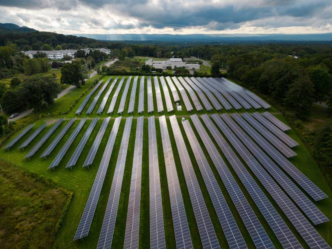 A field of solar panels along West Bay Road in Amherst. A field of solar panels along West Bay Road in Amherst.