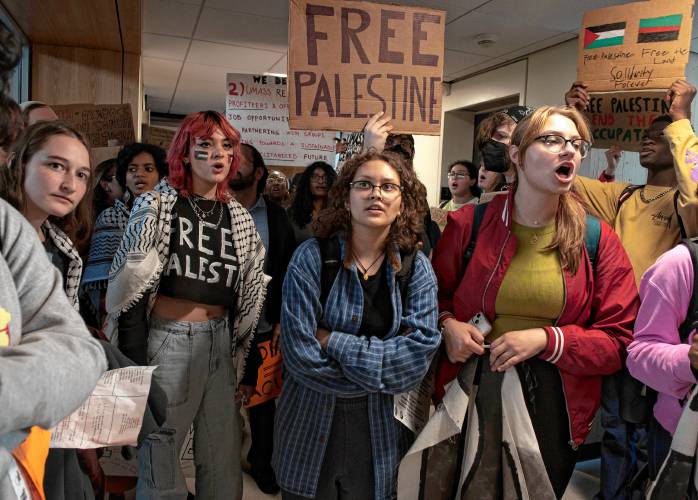 UMass students gather outside the chancellor’s office in the Whitmore administration building during a walkout and sit-in on Oct. 25 to demand the university cut ties with weapons makers and condemn Israeli actions in Gaza.