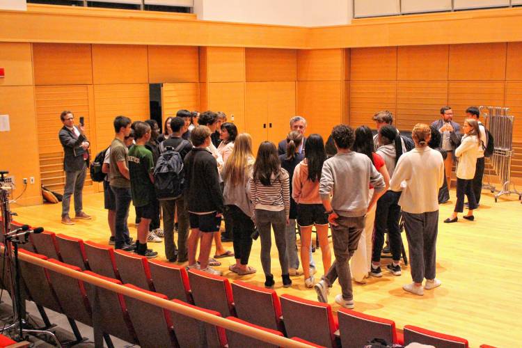 Republican State Committee Chair Amy Carnevale and Democratic State Committee Chair Steve Kerrigan speak with Deerfield Academy students on Tuesday.