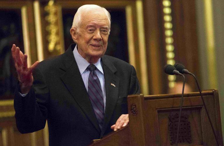 Former President Jimmy Carter speaks on the eradication of the Guinea worm on Feb. 3, 2016, at the House of Lords in London.