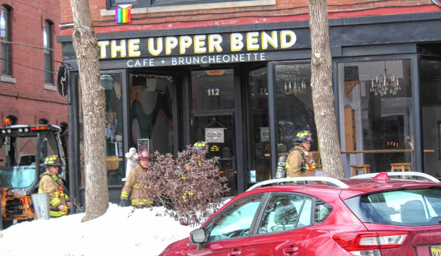Turners Falls firefighters close off a portion of Avenue A after a report of a gas leak from the basement of The Upper Bend on Friday afternoon.