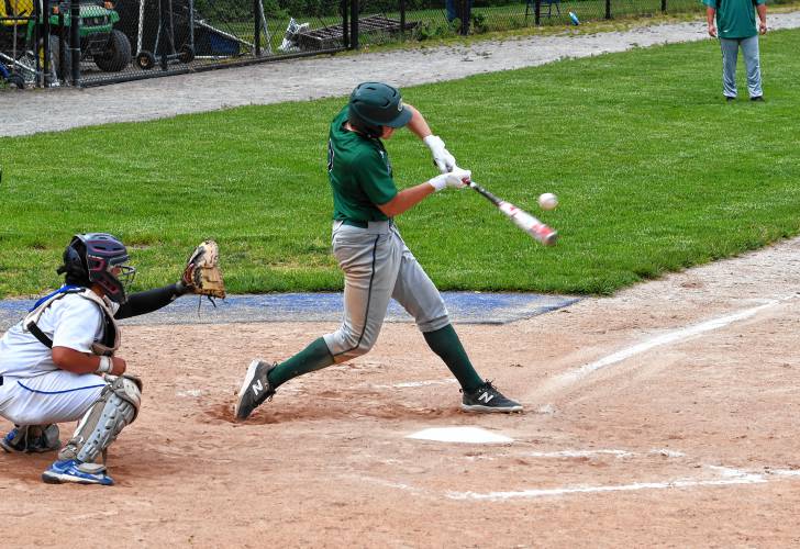 Greenfield’s Michael Pierce smacks a single against Boston English during the Green Wave’s 2-0 loss in the MIAA Division 5 semifinal round on Tuesday at Assumption University in Worcester.