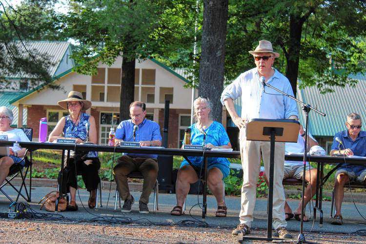 Whately Selectboard members Julie Waggoner, Fred Baron and Joyce Palmer-Fortune, as well as Town Moderator Nathanael Fortune, at Tuesday’s Annual Town Meeting.