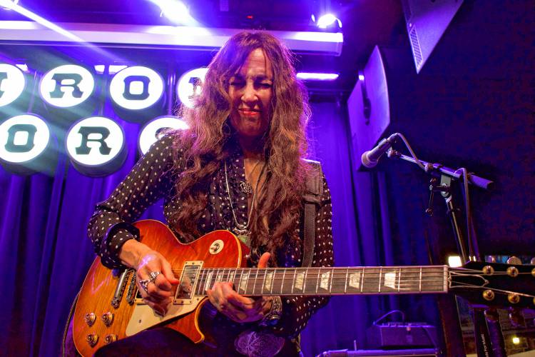 Steph Paynes, Lez Zeppelin lead guitarist, on stage at the Iron Horse in Northampton.