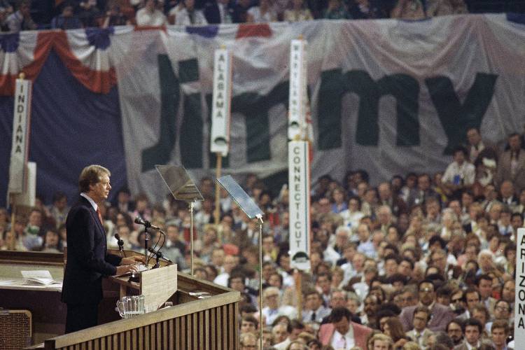 Jimmy Carter gives his acceptance speech after accepting the Democratic nomination for president on the convention floor on July 15, 1976, at New York’s Madison Square Garden.
