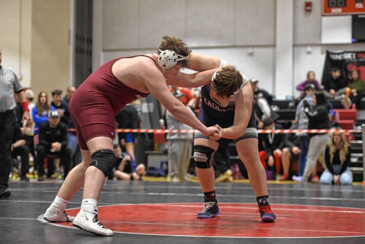 Franklin Tech's Dillon Laffond competes against Monument Mountain's Sam St. Peter in the championship match at 285 during the MIAA Div. 3 West Championship at Mount Greylock High School Saturday. 