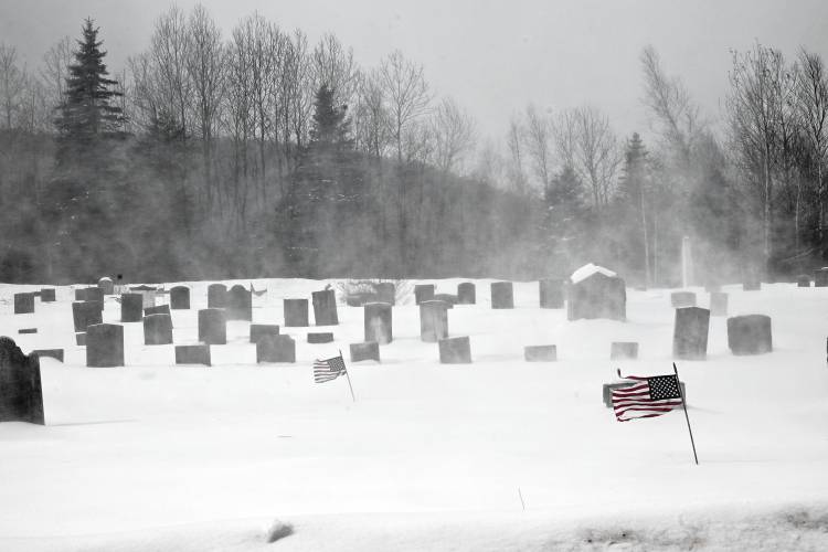 High winds whip snow across the Pudding Hollow Cemetery in Hawley on Monday.