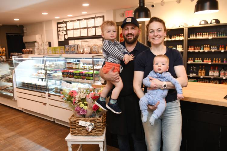 Flis Market owners Jon and Liz Flis with their children Jack, 2, and Oliver, 4 months.