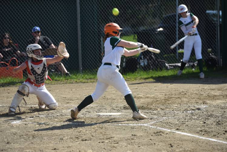 Greenfield’s Olivia Lemay fouls off a pitch during the Green Wave’s 5-2 win over Agawam on Friday afternoon at Vets Field in Greenfield.
